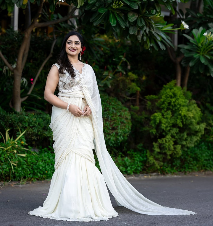 Beige ruffle saree