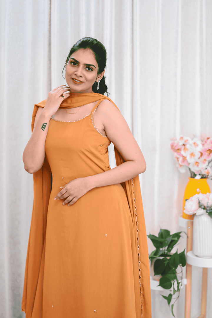 Elegant Mustard Straight-Cut Suit Set with Hand Embellished Neckline & Dupatta