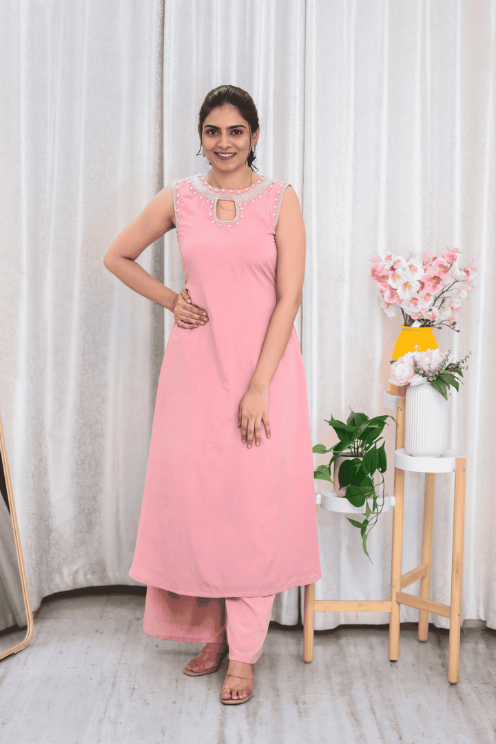 Blush Pink Elegance: Sleeveless Kurti Set with Floral Bead Embellishments