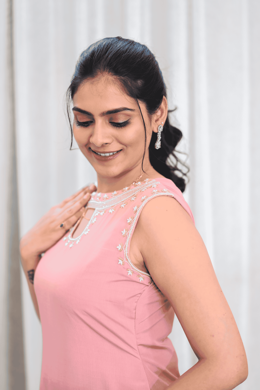 Blush Pink Elegance: Sleeveless Kurti Set with Floral Bead Embellishments